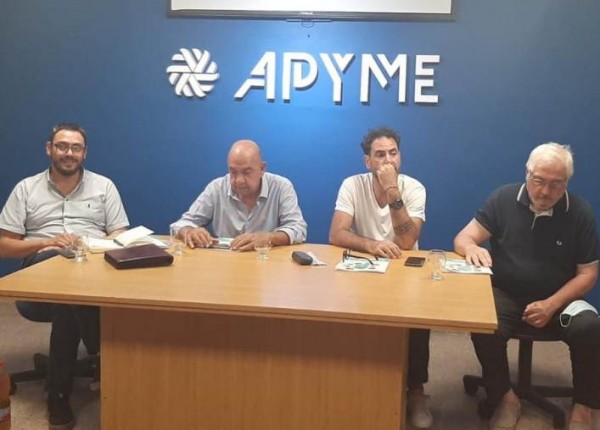 Pablo Tissera y Eduardo Fernández en reunión de APYME
